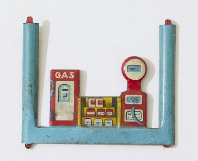 c1950's pressed tin service station forecourt diorama panel.