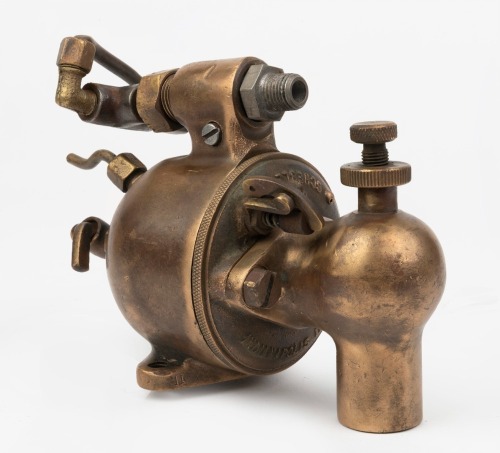 FLOAT BOWL CARBURETTOR: A Schebler (USA) solid brass float bowl carburettor, inlet width 0.9 inches