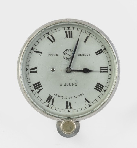 JAEGER: A Jaeger - Paris (Swiss made) two day dash clock, inscribed '126947' at rear, white face with black dial & Roman numerals, lens diameter 7.5cm