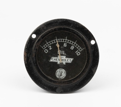 CHEVROLET: A circa late 1910s or early 1920s Chevrolet oil pressure gauge, diameter overall 6.5cm