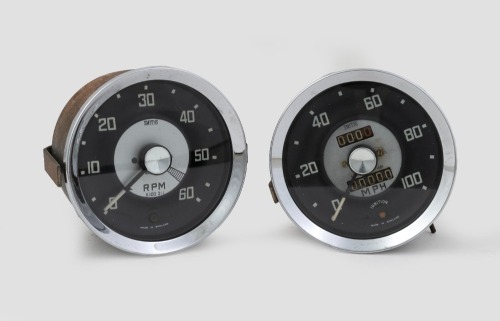 SMITHS: Two Smiths gauges, includes a 100 MPH speedometer with trip counter and 60000 RPM tachometer, lens diameter on both 9cm