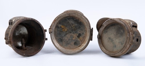 HEADLAMPS: Three small headlamps believed to be possibly motorcycle headlamps, includes two Powell & Hanmer lamps and one unknown lamp