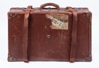 SUITCASE: A vintage cowhide suitcase circa 1920s / 1930s made by Jaxon (Australia), length 66cm, width 38cm, depth 19cm, with leather straps & functioning locks