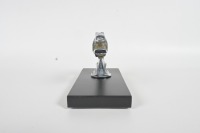 GREYHOUND MASCOT: A circa 1920s C. Brau Art-Deco greyhound mascot, commonly used on Delage, Lincoln & Ford, affixed to timber base, 19.5cm long - 2