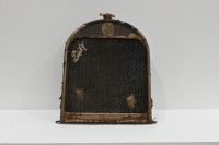RUGBY: A circa 1920s Rugby radiator, includes core, surround a 'dog bone' style cap and two badges, 67cm high, 51cm wide