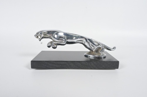 JAGUAR: A circa late 1940s Jaguar 'leaping Jaguar' mascot, to suit SS, MkIV & MkV, 20cm long, affixed to timber base