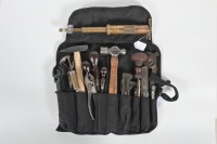 TOOL ROLL: A group of circa 1920s to 1940s British made tools to suit British make vehicles