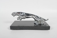 JAGUAR: A circa late 1940s Jaguar 'leaping Jaguar' mascot, to suit SS, MkIV & MkV, 20cm long, affixed to timber base