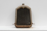 BUICK: A circa mid 1920s Buick radiator, includes the core, surround, badge and cap, 80cm high, 50cm wide