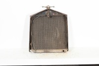 RADIATOR: A circa 1910s or 1920s US made radiator, includes core, surround and 'dog-bone' cap, 76cm high, 61cm wide - 3