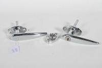 DOOR HANDLES: Two circa 1920s to 1950s chrome door handles, one with lock and also including one partial bracket piece - 2