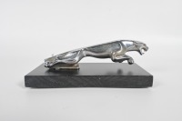 JAGUAR: A circa 1960s to 1980s Jaguar 'leaping Jaguar' mascot, to suit various models, 20cm long, affixed to timber base, broken tail piece - 3
