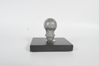 SKULL KNOB: An alloy human skull gear knob affixed to timber base, knob 7cm high - 3