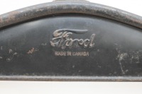 FORD: A Ford model 'T' radiator surround, inscribed 'Ford - Made in Canada', 56cm high, 52cm wide - 2