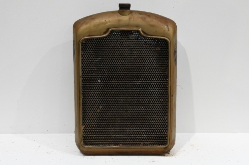 RADIATOR: A small circa 1910s or 1920s radiator, includes the core, surround & cap, 64cm high, 41cm wide