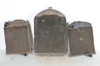 RADIATORS: Three radiators, includes one with Harrison Cooled (USA) tag (H 79cm x W50cm), and two smaller radiators