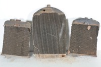 RADIATORS: Three radiators, includes one with Harrison Cooled (USA) tag (H 79cm x W50cm), and two smaller radiators - 5