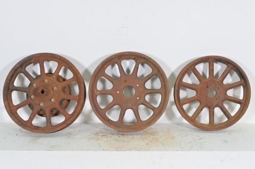 WHEELS: Three solid steel 10 spoke veteran wheels of varying sizes