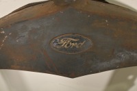 FORD: A circa 1910s Ford radiator surround, including oval badge with black background, 72cm high, 52cm wide - 3