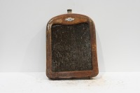 CHEVROLET: A circa mid 1920s Chevrolet radiator, includes the core, surround, cap & badge, 72cm high, 52cm wide