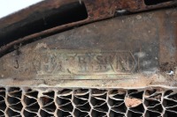 CHEVROLET: A circa mid 1920s Chevrolet radiator, includes the core, surround, cap & badge, 72cm high, 52cm wide - 2