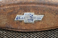 CHEVROLET: A circa mid 1920s Chevrolet radiator, includes the core, surround, cap & badge, 72cm high, 52cm wide - 4
