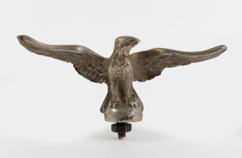 WINGED MASCOT: An alloy winged hood ornament, 15cm wide