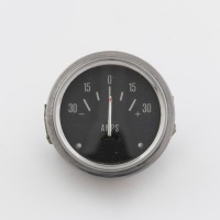 AMMETER: A circa 1950s Unical ammeter gauge, lens diameter 4.5cm