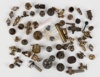 BRASS FITTINGS: An assortment of various early mostly small brass fittings and some dash switches