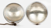 HEADLAMPS: A pair of large headlamps with Twilite lenses, lens width 22cm