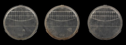 FORD: Three Ford Model 'A' Twolite headlight glass lenses, width 19.5cm (exposed lens), all branded with Ford logo