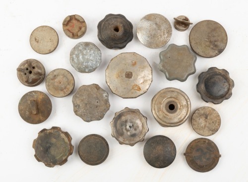 RADIATOR CAPS: A group of assorted radiator caps of varying shapes & sizes
