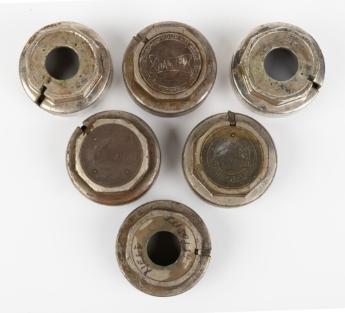 WHEEL CAPS: A group of six early wire wheel centre caps of similar fitting, width on all 9.5cm, some branded Chandler & Anderson
