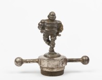 MICHELIN: A nice early nickel plated brass figural mascot of Monsieur Michelin Bibendum, figure 9.5cm high - 2