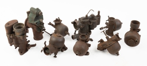 CARBURETTORS: A group of nine early carburettors
