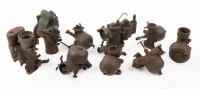 CARBURETTORS: A group of nine early carburettors