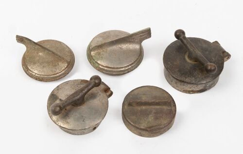 RADIATOR CAPS: A group of five radiator caps, includes two 'dog-bone' style caps, two art deco style caps and on standard cap