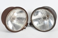 LUCAS: A pair of Lucas 700 headlamps, commonly used on British makes from 1940s to 1960s, lens width 17.8cm