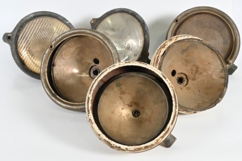 HEADLAMPS: A collection of c1920s / 1930s Lancia headlamps including three with eight inch glass & three other headlamp shells