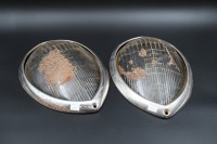 FORD: Two circa 1939 Ford Standard twolite headlight lenses and chrome surrounds