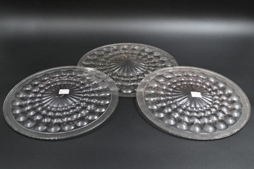 WARNER-LENZ: Three circa 1910s Warner-Lenz bubble style headlamp lenses, includes two 23cm wide and one 25cm wide