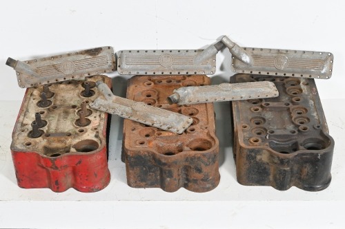 LANCIA: Three Lancia Lambda cylinder heads with a group of side (water) covers