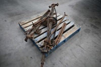LANCIA: A pallet of assorted Lancia Lambda items, includes axle & differential, leaf springs with brackets, a tailshaft & two half shafts - 4