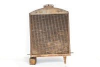 RADIATOR: A circa early 1920s US made radiator, includes the core, surround & cap, 74cm high, 58cm wide