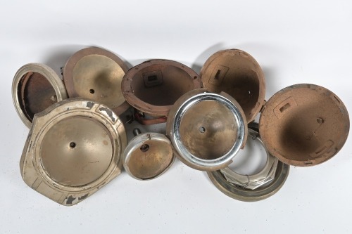 HEADLIGHT PARTS: A tub of assorted dome style headlight parts