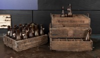 BEER CRATES: A group of four vintage eastern European timber beers crates and vintage bottles