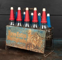 ESSO: A circa 1970s "Esso Extra Multigrade" 10-bottle set and stand, with matching plastic pourers and caps - 2
