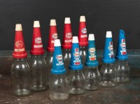 ESSO: A circa 1970s "Esso Extra Multigrade" 10-bottle set and stand, with matching plastic pourers and caps - 3