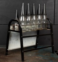 ESSO: A circa 1970s "Esso Superlube Premium Motor Oil 10 bottle set and stand, with matching plastic pourers and caps - 2