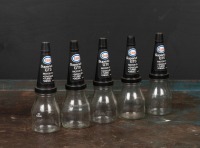 ESSO: A circa 1970s "Esso Superlube Premium Motor Oil 10 bottle set and stand, with matching plastic pourers and caps - 4